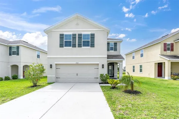 a view of swimming pool with outdoor seating