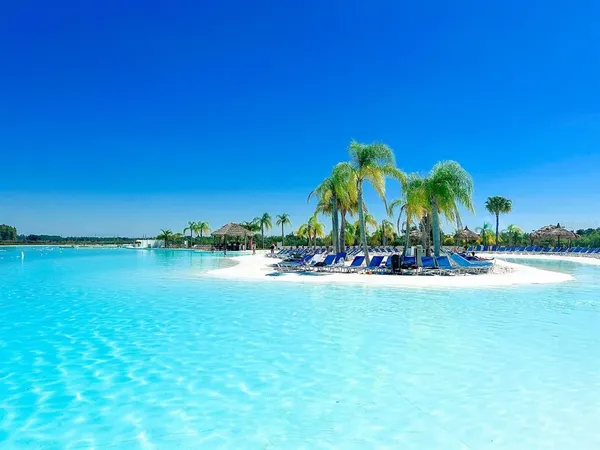 a view of a lake with a yard