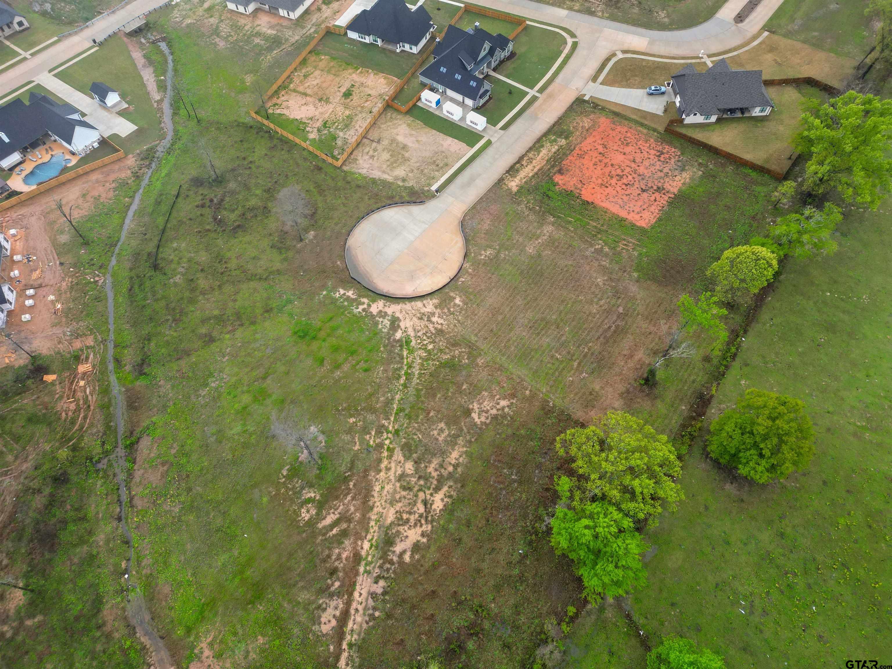 12015 Cedar Circle Flint, TX 75762 - Photo 7 of 14 an aerial view of a house with yard and patio