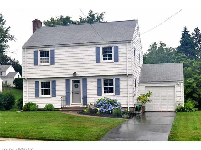 24 Greystone Road West Hartford, CT 06107 - Photo 1 of 1 a front view of a house with a garden