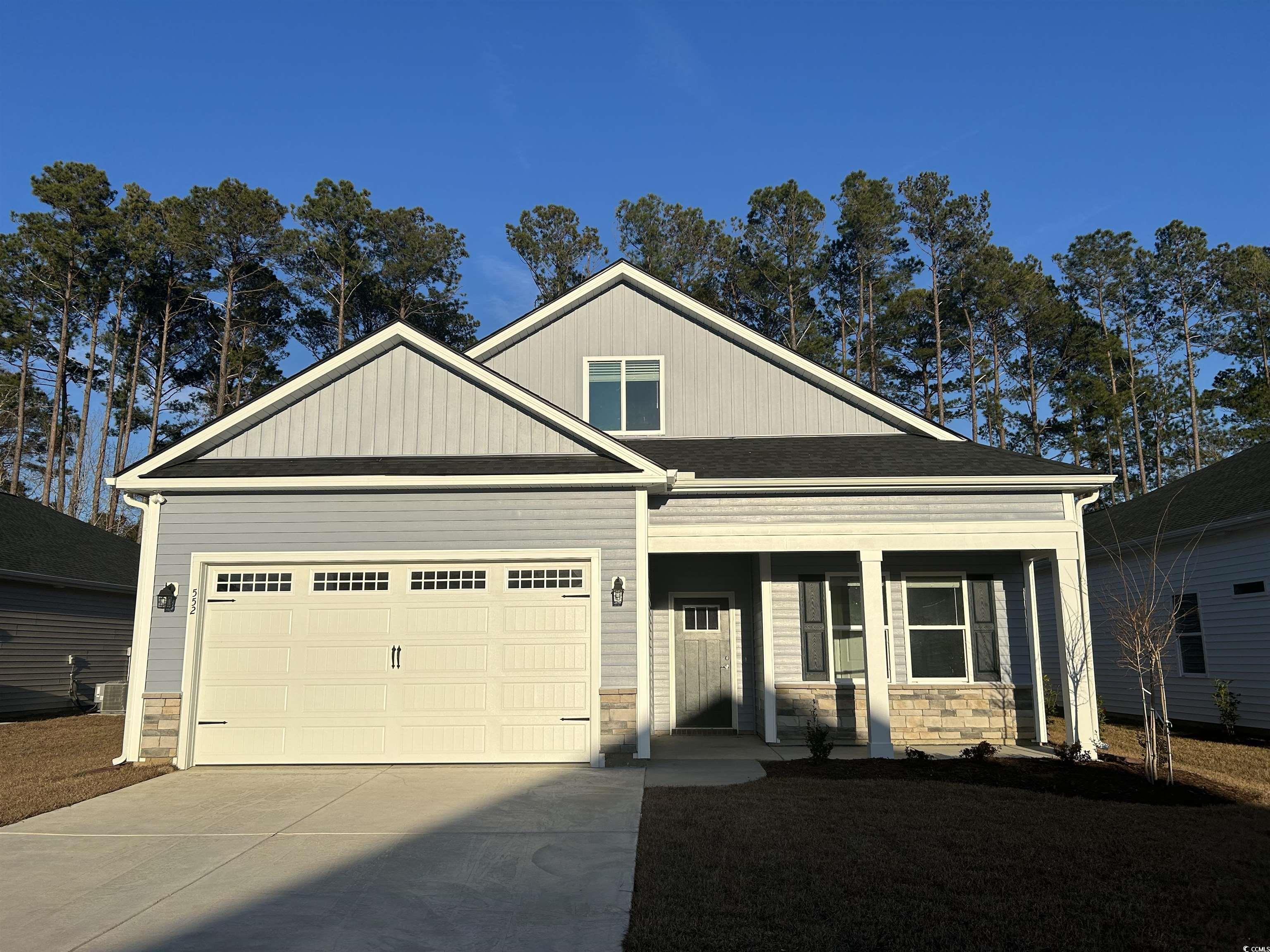 552 Beckham Court Murrells Inlet, SC 29576 - Photo 1 of 27 Craftsman house with a porch and a garage
