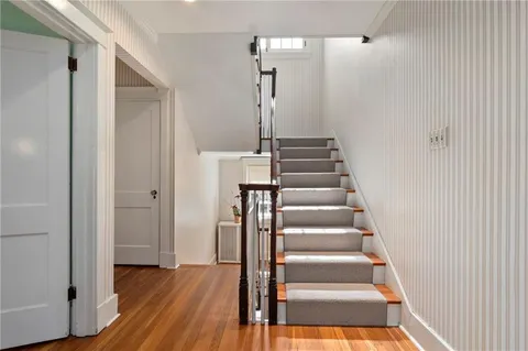 a view of entryway with wooden floor
