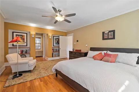 a bed room with a bed and a couch