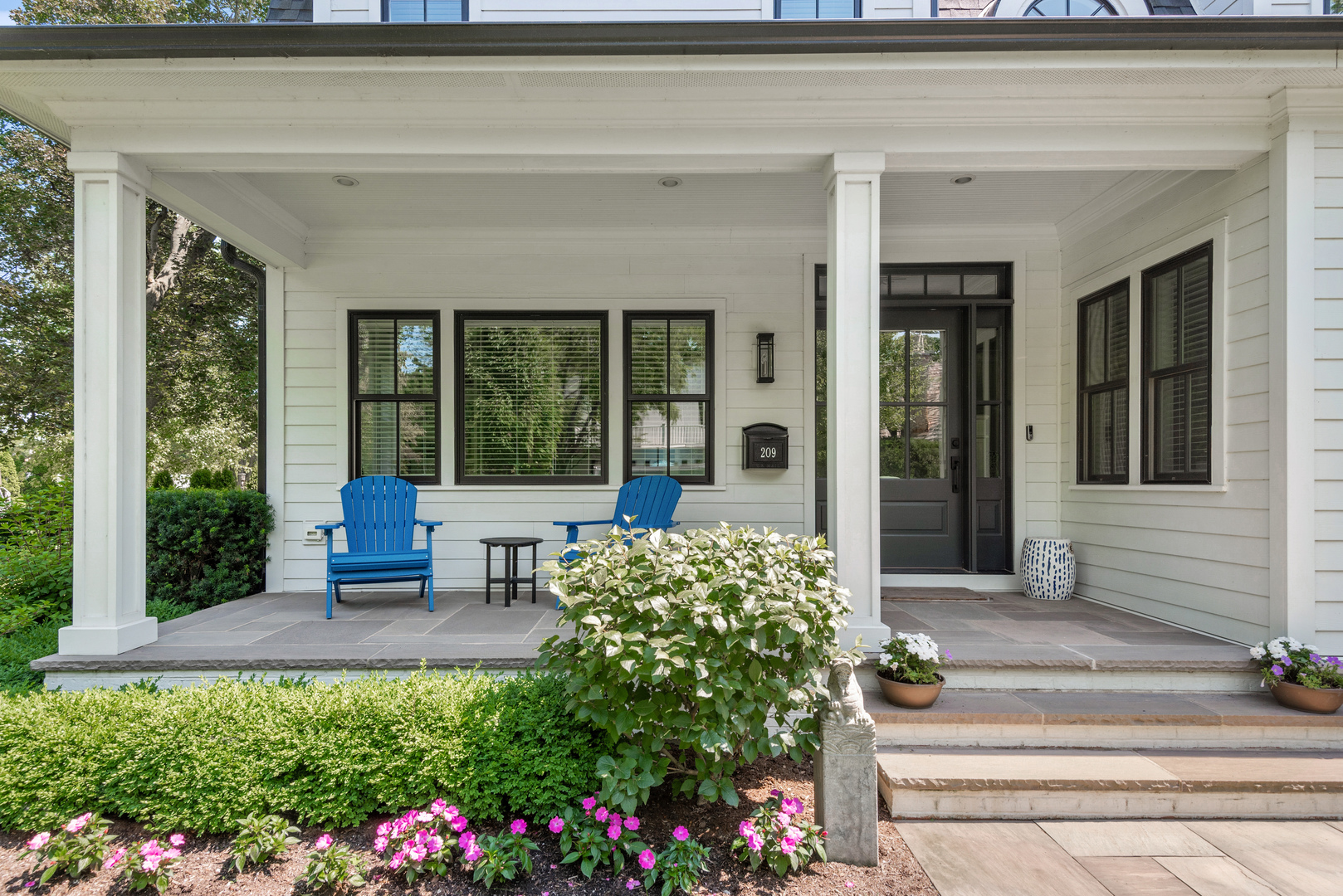 209 Fuller Lane Winnetka, IL 60093 - Photo 3 of 9 a view of a house with outdoor seating