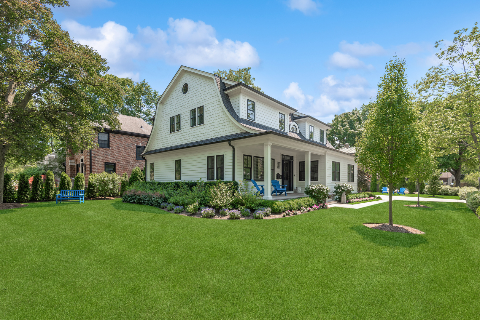 209 Fuller Lane Winnetka, IL 60093 - Photo 6 of 9 a front view of house with a garden and plants