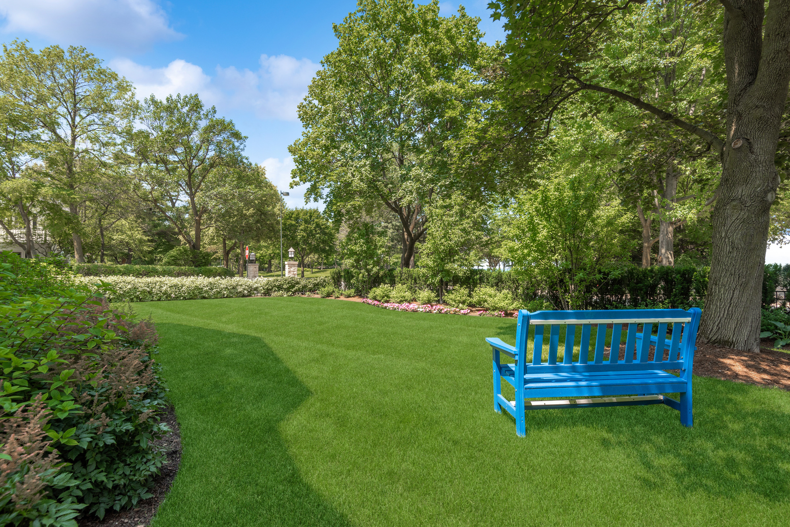 209 Fuller Lane Winnetka, IL 60093 - Photo 9 of 9 a view of a bench in the garden