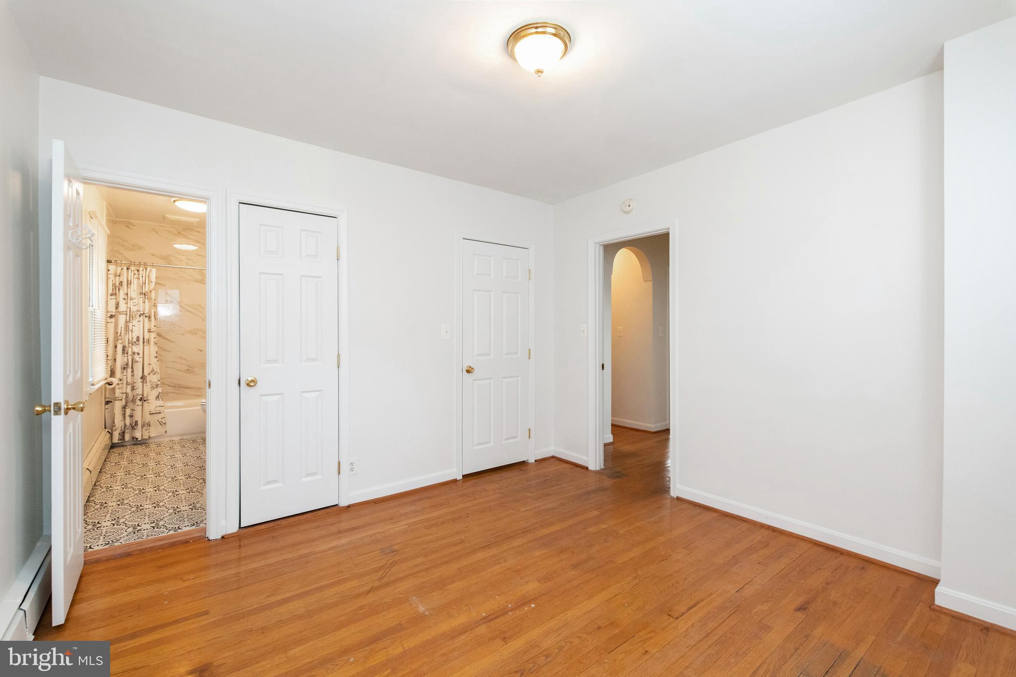 518 Anneslie Road Baltimore, MD 21212 - Photo 19 of 35 Primary bedroom with hardwood floors