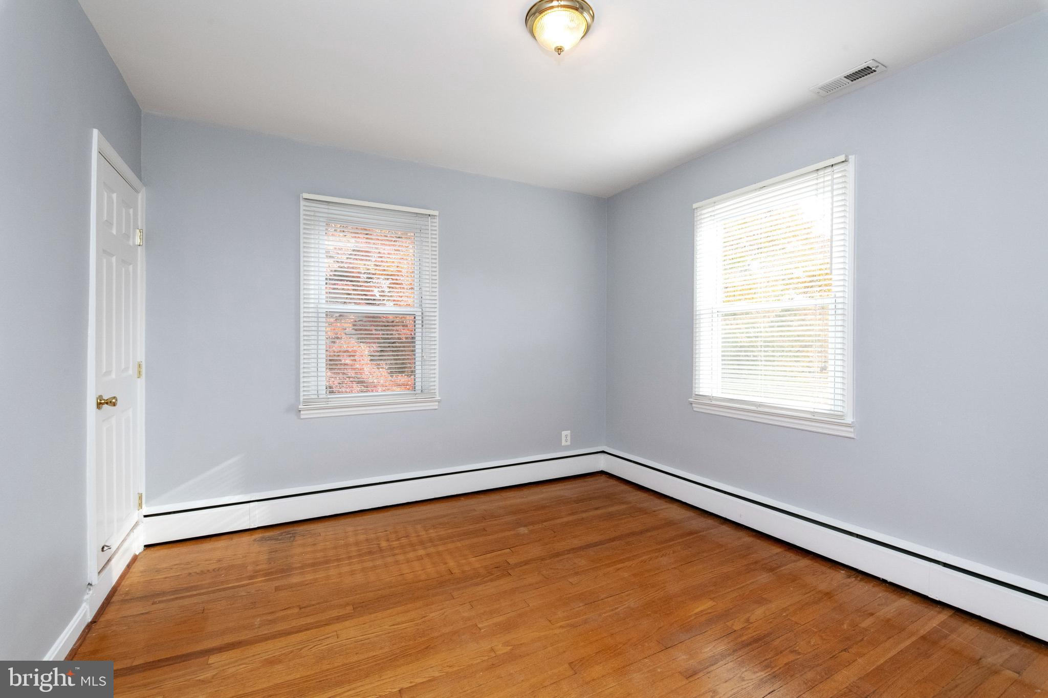 518 Anneslie Road Baltimore, MD 21212 - Photo 28 of 35 Light-filled third bedroom with hardwood floors