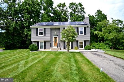 11802 Flora Lane Bowie, MD 20721 - Photo 1 of 26 Front view with manicured yard