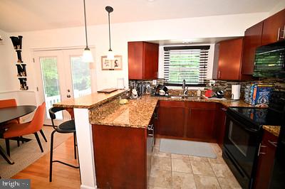 11802 Flora Lane Bowie, MD 20721 - Photo 11 of 26 Upper Kitchen w/granite countertops