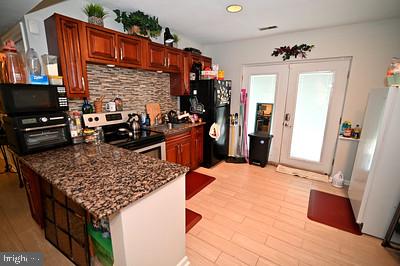 11802 Flora Lane Bowie, MD 20721 - Photo 23 of 26 Full Kitchen lower level