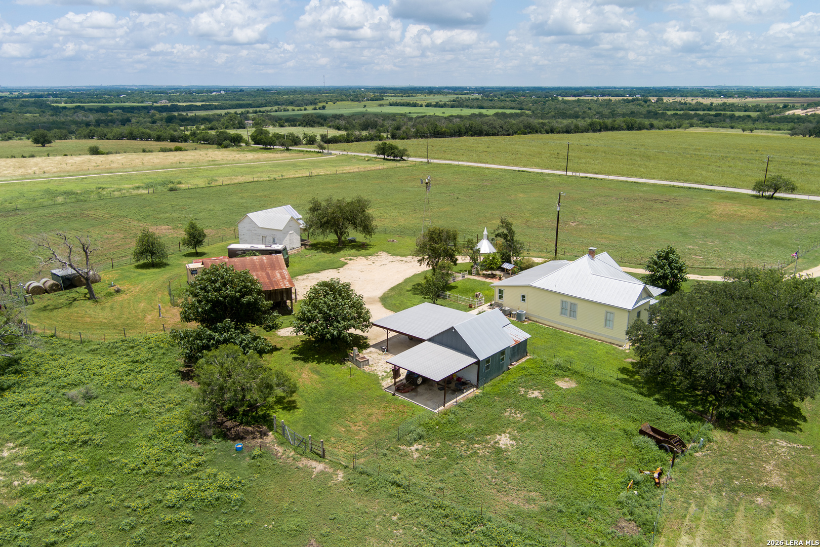 4515 Stapper Road St. Hedwig, TX 78152 - Photo 62 of 64 an aerial view of a house with a lake view