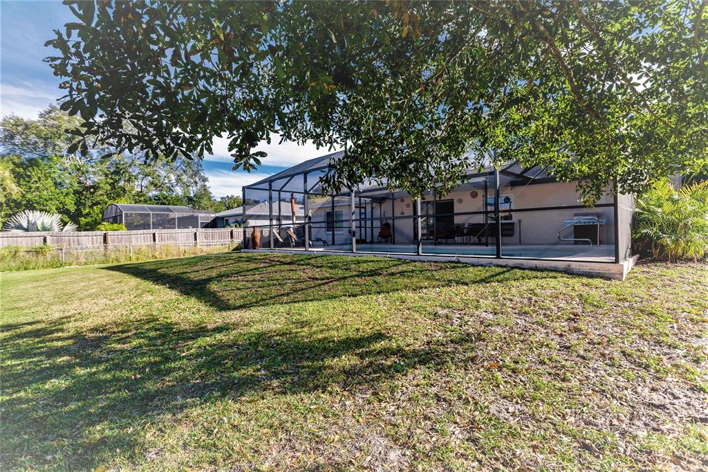 912 72nd Street Northwest Bradenton, FL 34209 - Photo 3 of 25 a house view with swimming pool in front of it