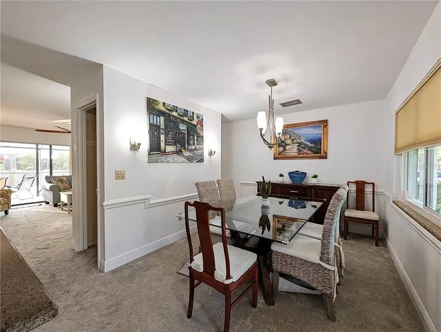 a view of a livingroom and dining room