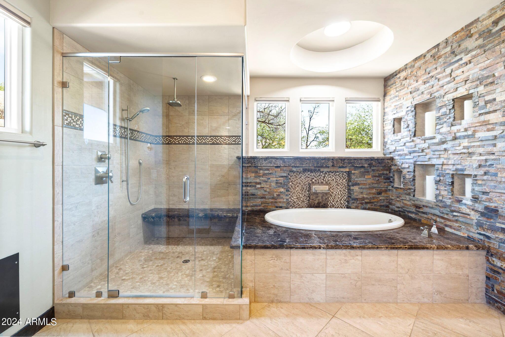 1398 Ridgewood Drive Prescott, AZ 86305 - Photo 18 of 34 a bathroom with a granite countertop sink a mirror and a shower