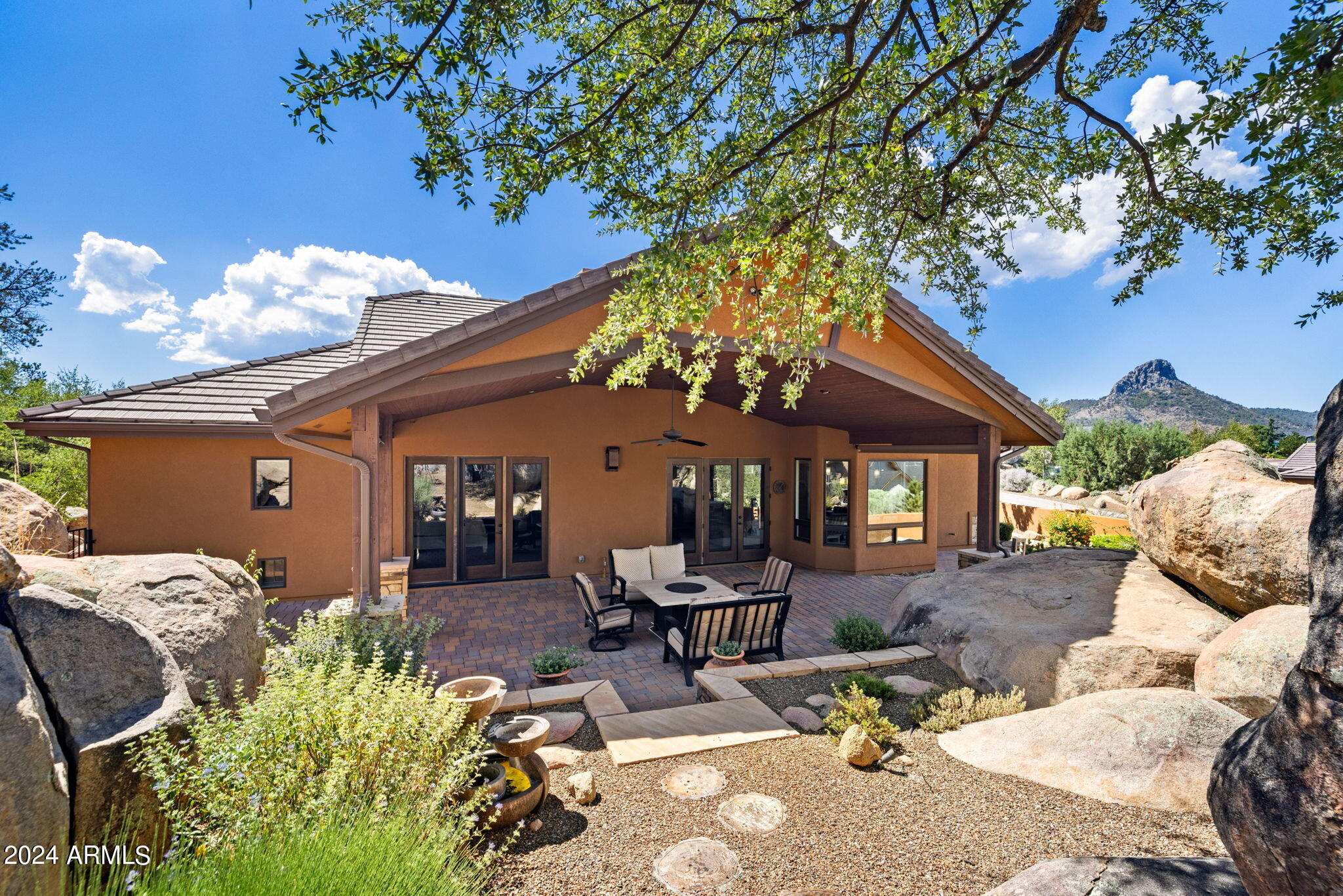1398 Ridgewood Drive Prescott, AZ 86305 - Photo 29 of 34 a view of a backyard with sitting area