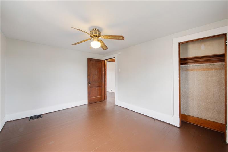 414 Virginia Avenue Rochester, PA 15074 - Photo 16 of 22 a view of an empty room with window and chandelier fan