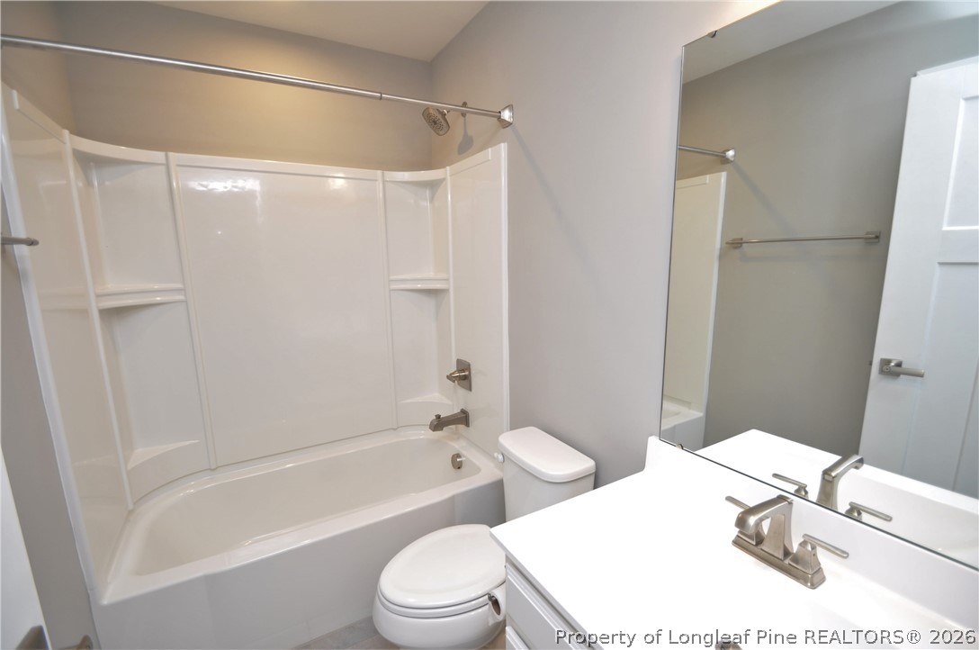 200 Misty Pike Drive Raleigh, NC 27603 - Photo 33 of 49 a bathroom with a sink toilet and shower