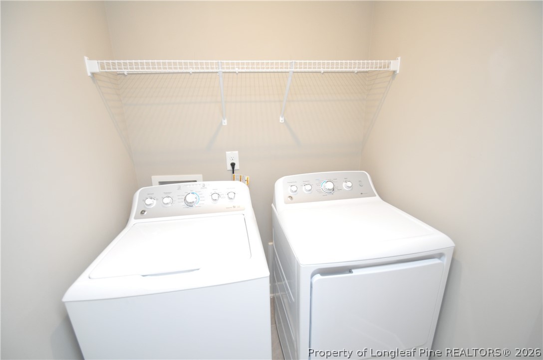 200 Misty Pike Drive Raleigh, NC 27603 - Photo 34 of 49 a utility room with dryer and washer