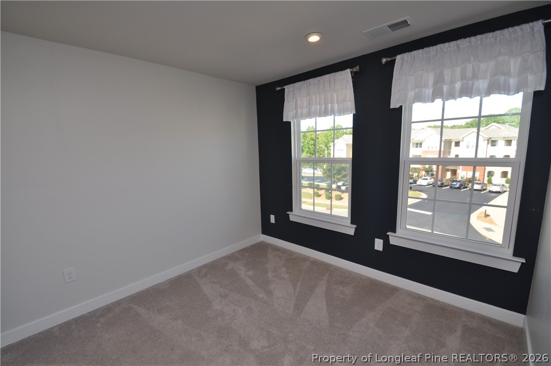 200 Misty Pike Drive Raleigh, NC 27603 - Photo 38 of 49 a view of an empty room with a window