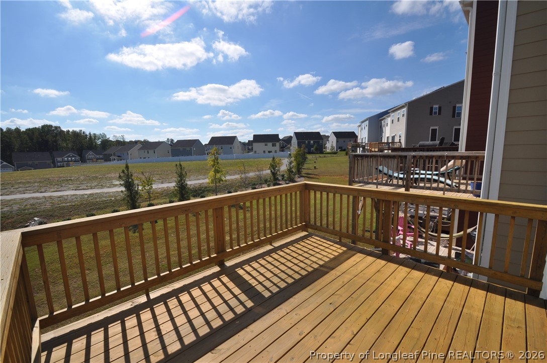 200 Misty Pike Drive Raleigh, NC 27603 - Photo 46 of 49 a view of balcony with wooden floor and city view