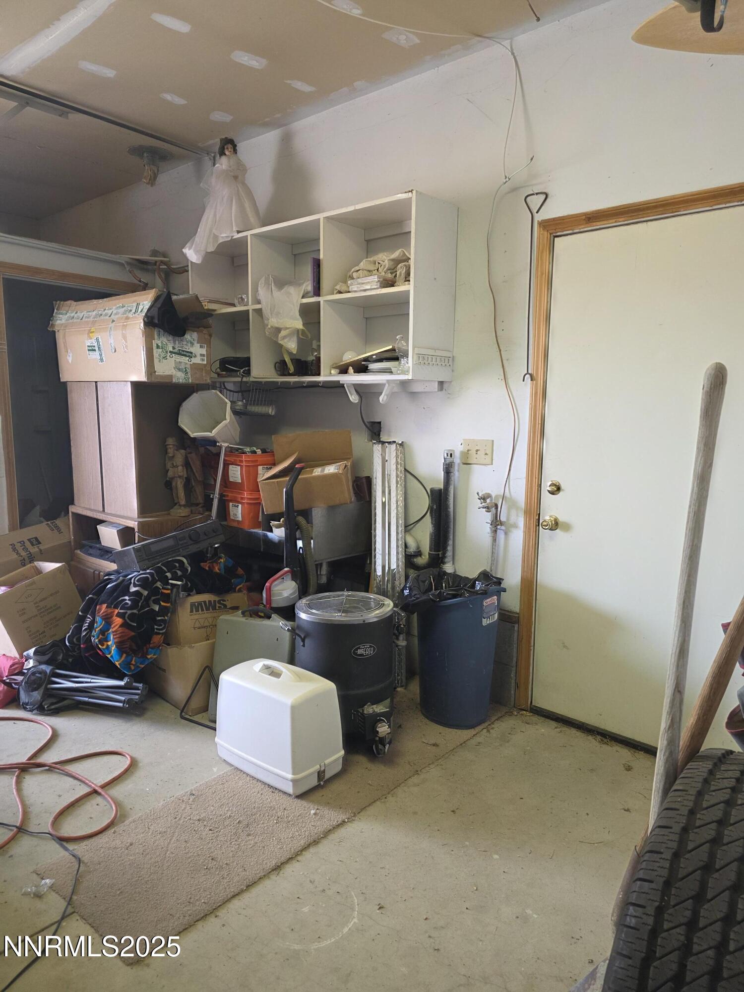 215 Cedar Street Hawthorne, NV 89415 - Photo 14 of 19 a room with storage and utility