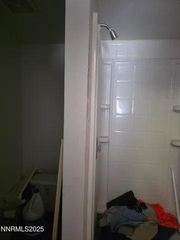 a view of room with gym equipment