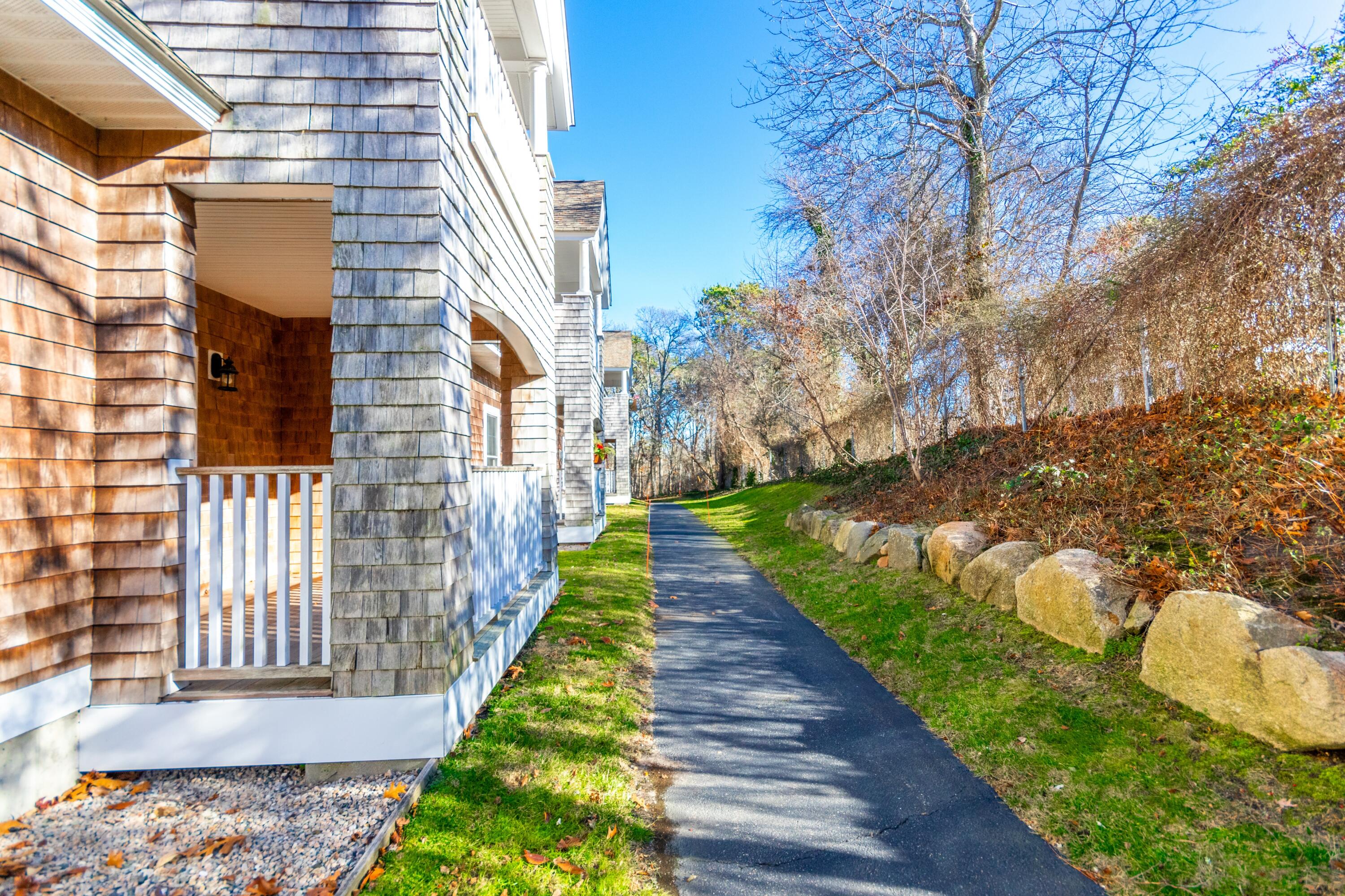 18 West Road, Unit 216 Orleans, MA 02653 - Photo 23 of 39 Walkway along the back