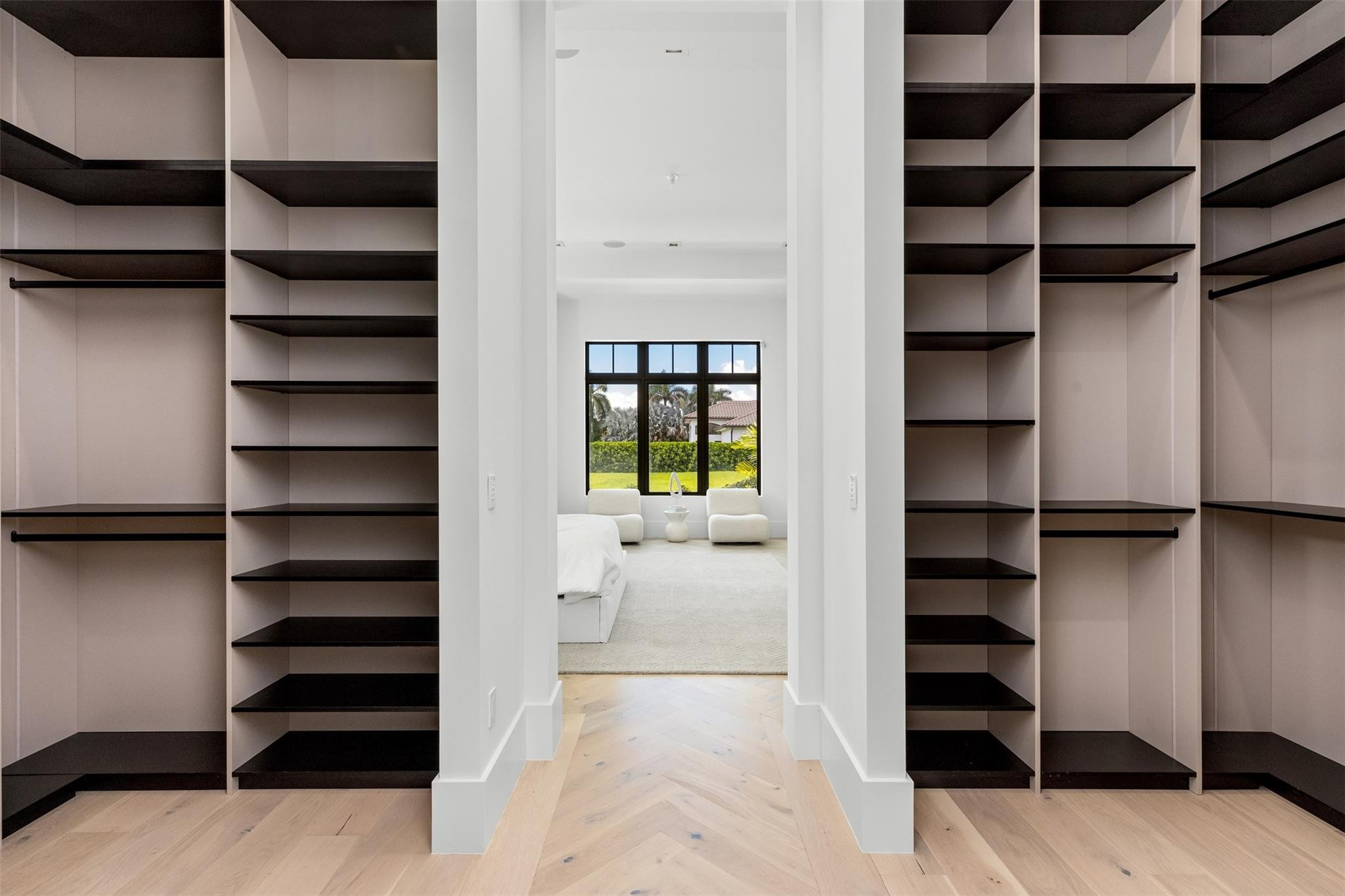 12701 Luray Road Southwest Ranches, FL 33330 - Photo 22 of 44 a view of walk in closet with empty racks