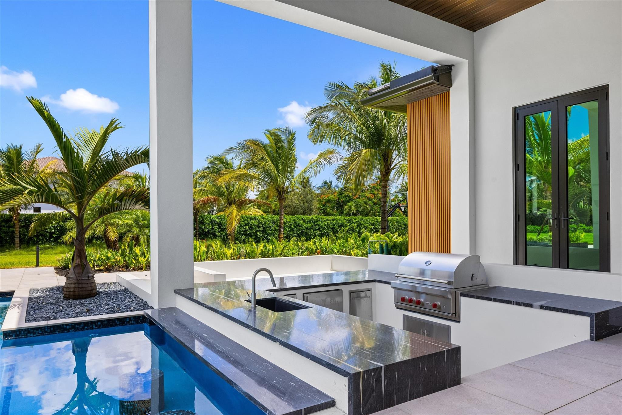 12701 Luray Road Southwest Ranches, FL 33330 - Photo 34 of 44 a living room with furniture and a potted plant
