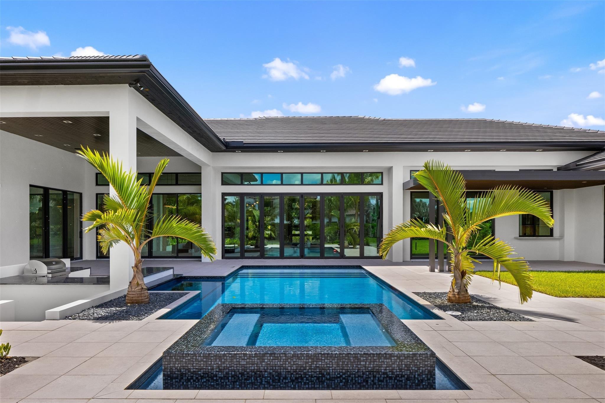 12701 Luray Road Southwest Ranches, FL 33330 - Photo 36 of 44 a view of a house with swimming pool and sitting area