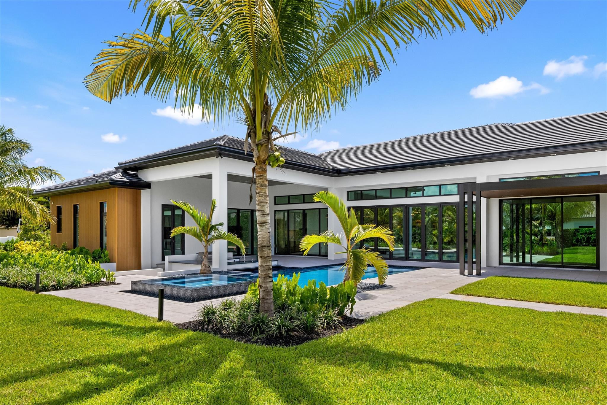 12701 Luray Road Southwest Ranches, FL 33330 - Photo 37 of 44 a house with swimming pool in front of it