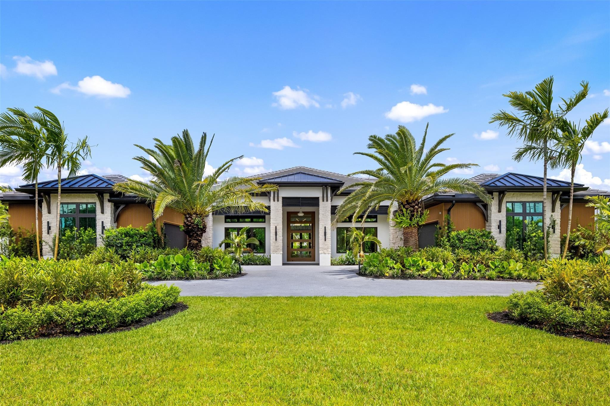 12701 Luray Road Southwest Ranches, FL 33330 - Photo 40 of 44 a front view of house with yard and green space