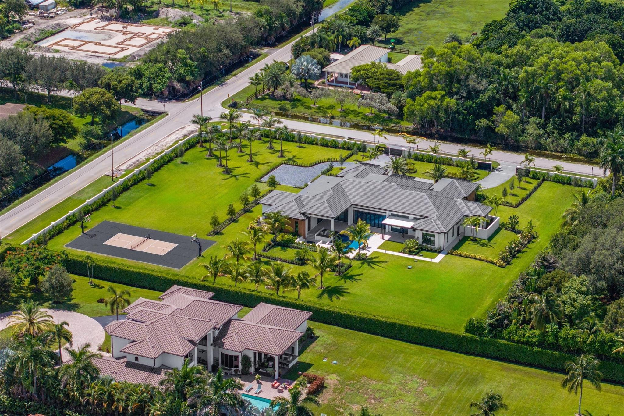 12701 Luray Road Southwest Ranches, FL 33330 - Photo 41 of 44 an aerial view of a house with a swimming pool yard and outdoor seating