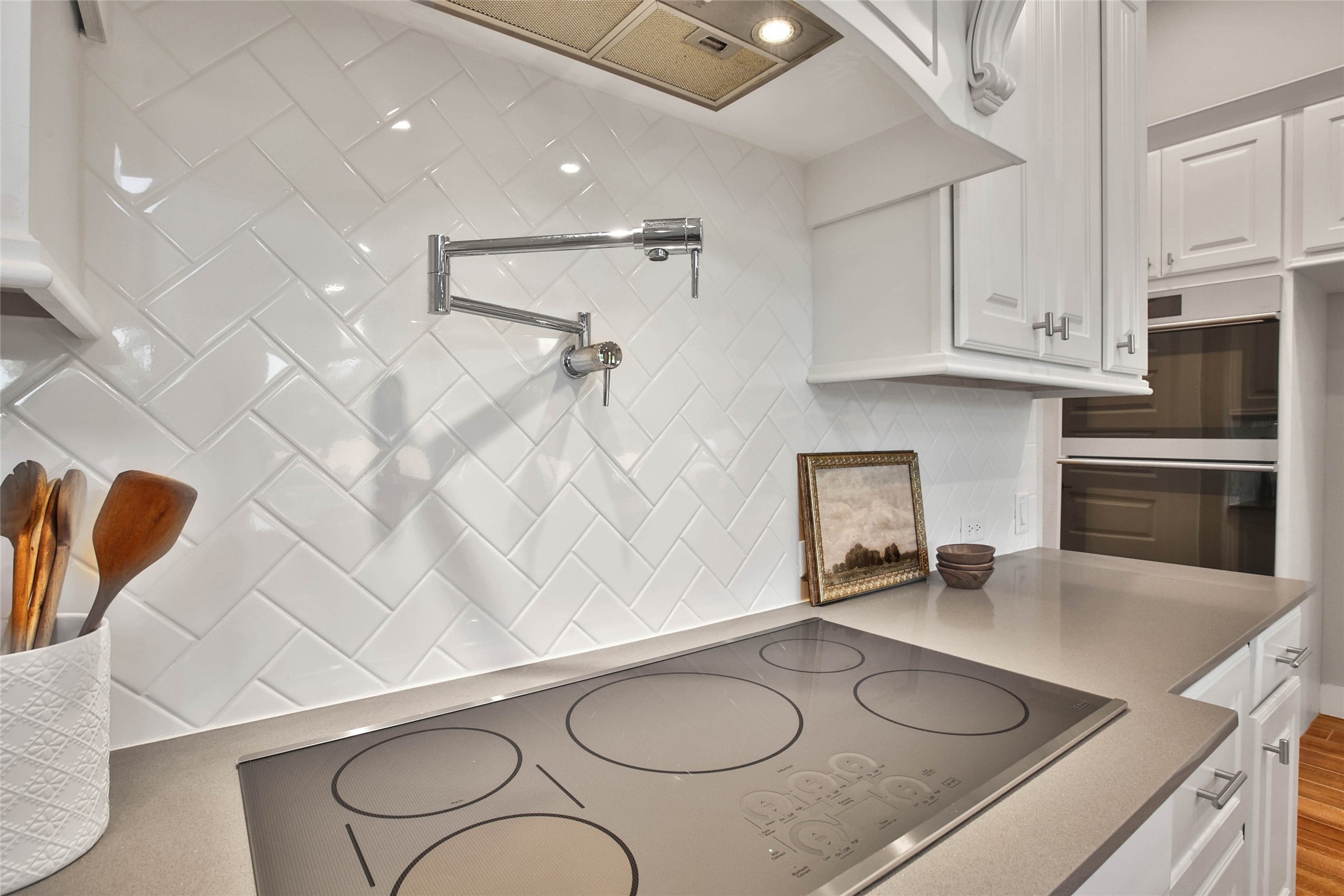 29402 Cir S Rnch Trail Fulshear, TX 77406 - Photo 14 of 50 You’ll love the ease and convenience of cooking with a handy pot filler and a Café 36" Smart Touch induction cooktop. These premium features make meal prep both efficient and enjoyable.