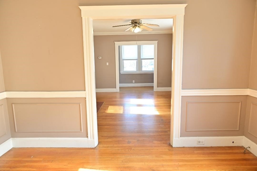 90 Elmer Road, Unit 2 Boston, MA 02124 - Photo 4 of 12 a view of a room that has a window