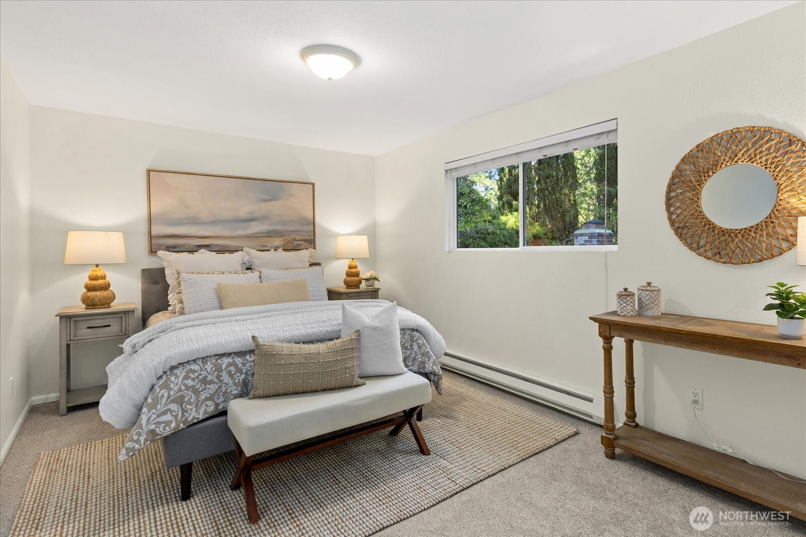 410 214th Street Southwest, Unit B Bothell, WA 98021 - Photo 17 of 37 a bedroom with a bed and window
