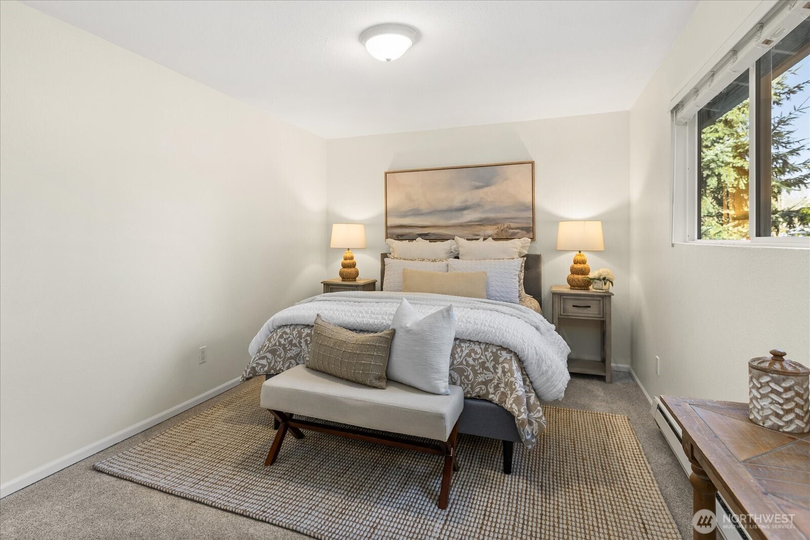 410 214th Street Southwest, Unit B Bothell, WA 98021 - Photo 18 of 37 a bedroom with a bed and wooden floor