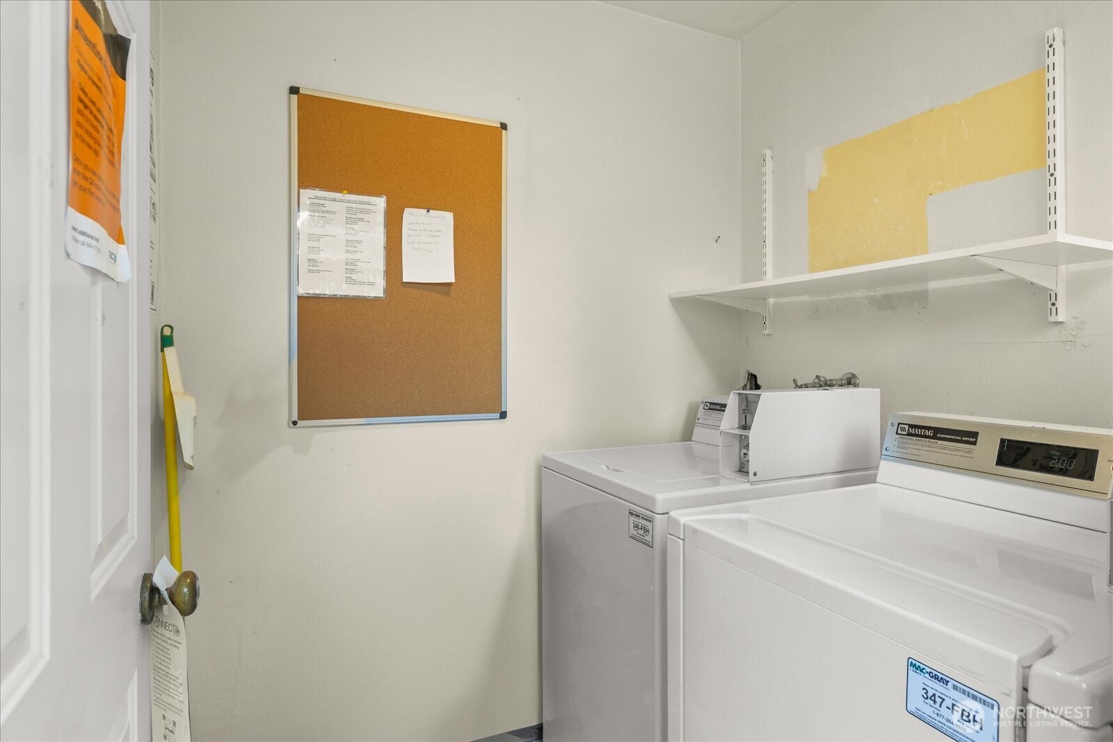 410 214th Street Southwest, Unit B Bothell, WA 98021 - Photo 26 of 37 a bedroom with a bed and a window