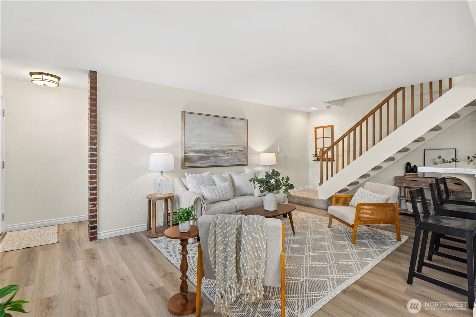 410 214th Street Southwest, Unit B Bothell, WA 98021 - Photo 7 of 37 a living room with furniture and wooden floor