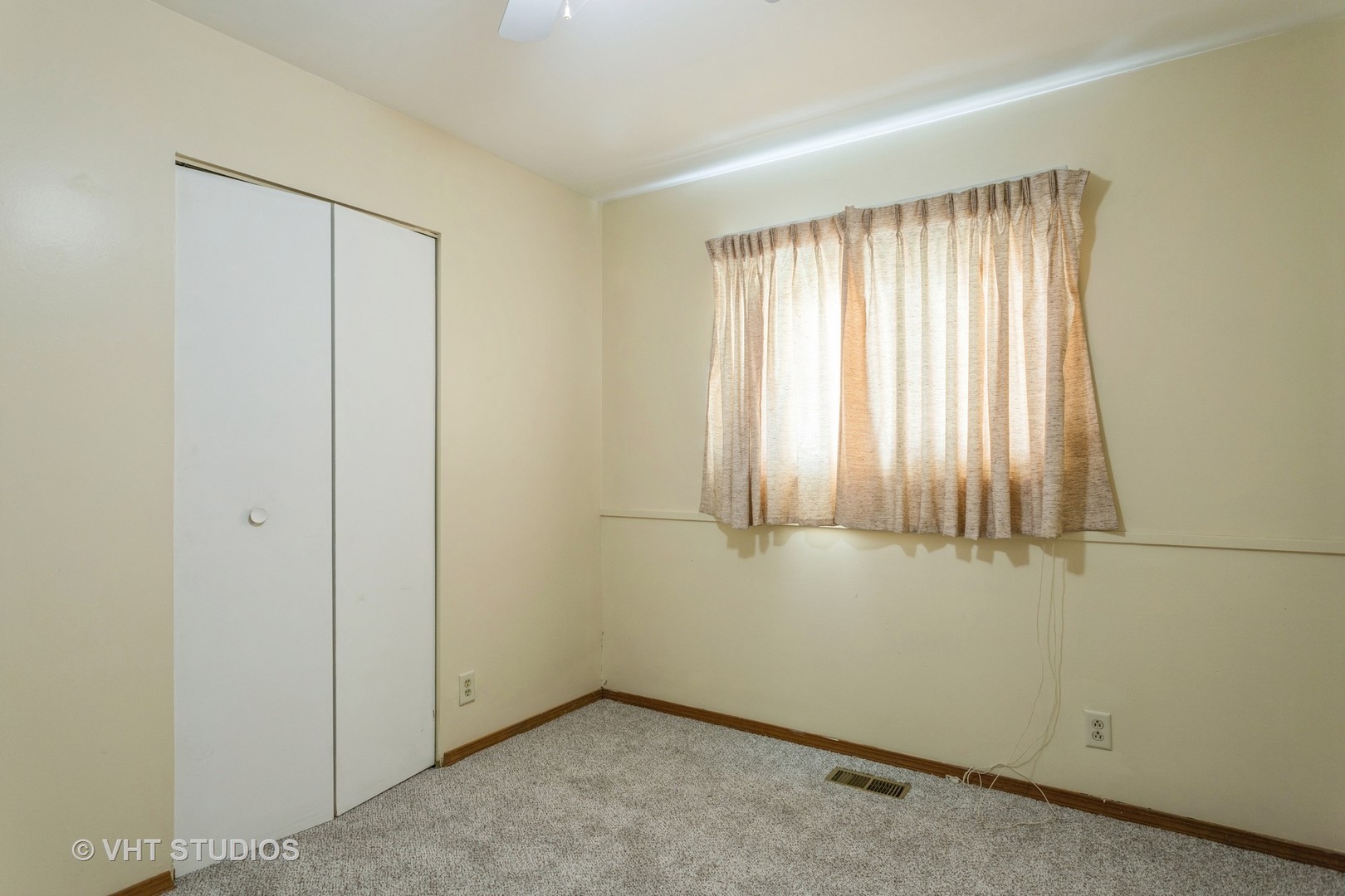 148 Springleaf Drive Bolingbrook, IL 60440 - Photo 11 of 24 a view of an empty room with a window
