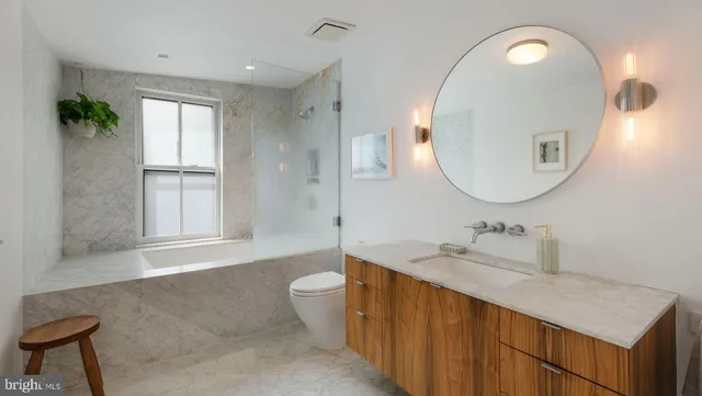 a view of a door and a window