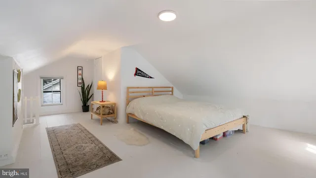 a view of a house with a yard porch and sitting area