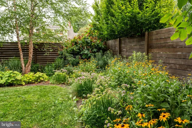 a couple of table and chair in front of door