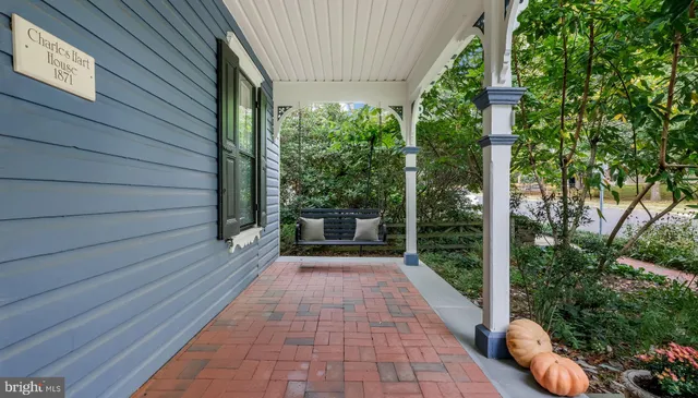 a bathroom with a bathtub and a large window