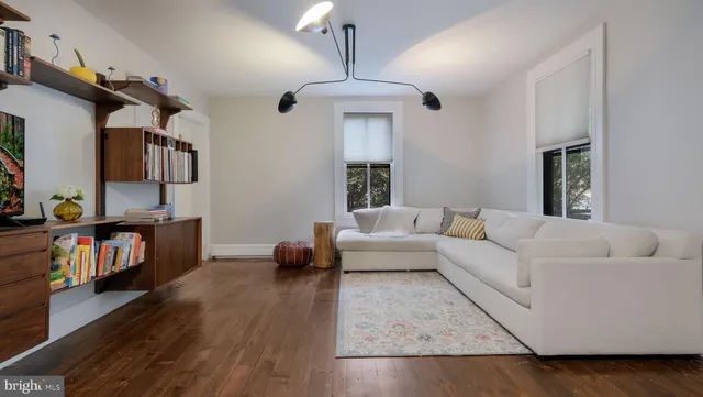 a kitchen with a stove a sink and a refrigerator