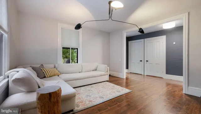 a kitchen with a table and chairs in it