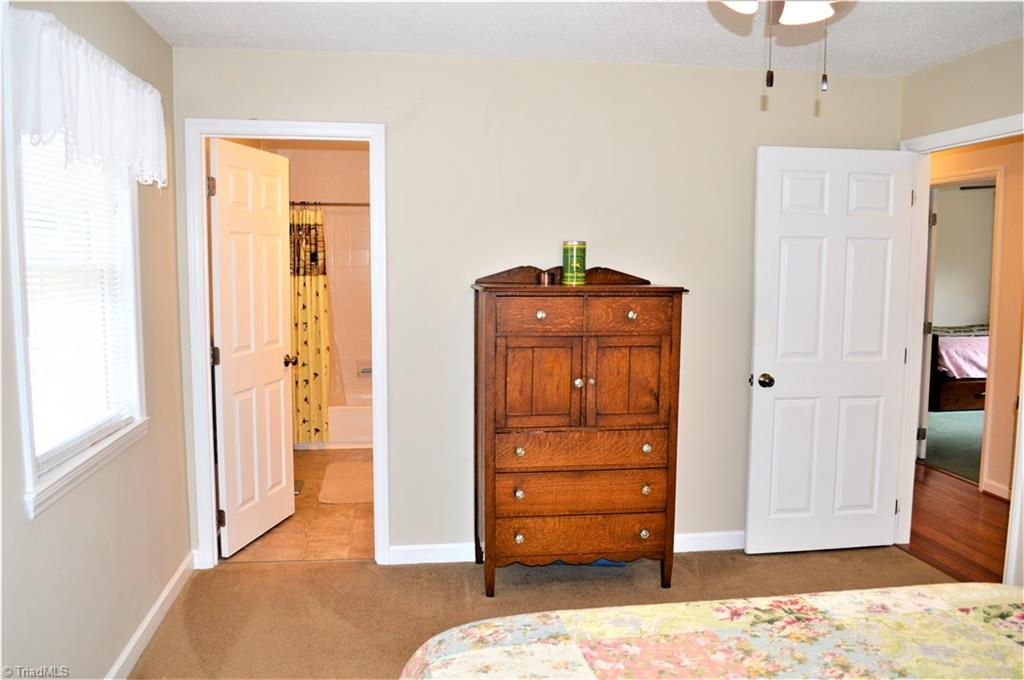 114 Rink Road Mayodan, NC 27027 - Photo 12 of 30 Master Bedroom: Carpet, Ceiling Fan, Walk-in Closet and has large Master Bathroom