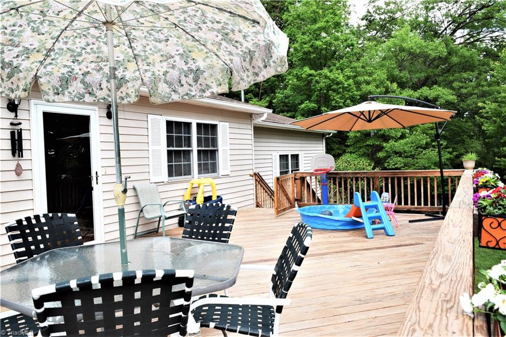 114 Rink Road Mayodan, NC 27027 - Photo 25 of 30 Huge Deck with Access on Both Sides. Even has Abundant Storage Underneath (gravel)
