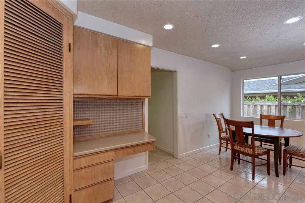 1671 Paseo Bonita La Jolla, CA 92037 - Photo 11 of 17 a view of a dining room with furniture and window